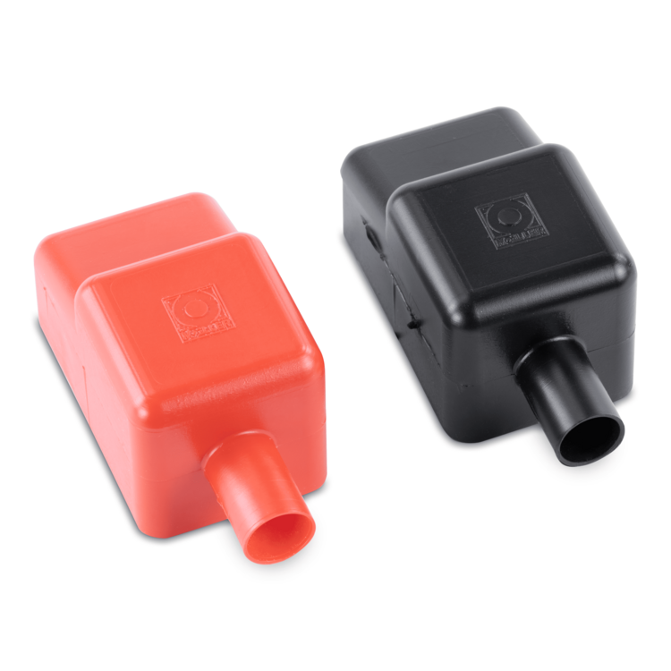 A red and black battery terminal cover on a white background