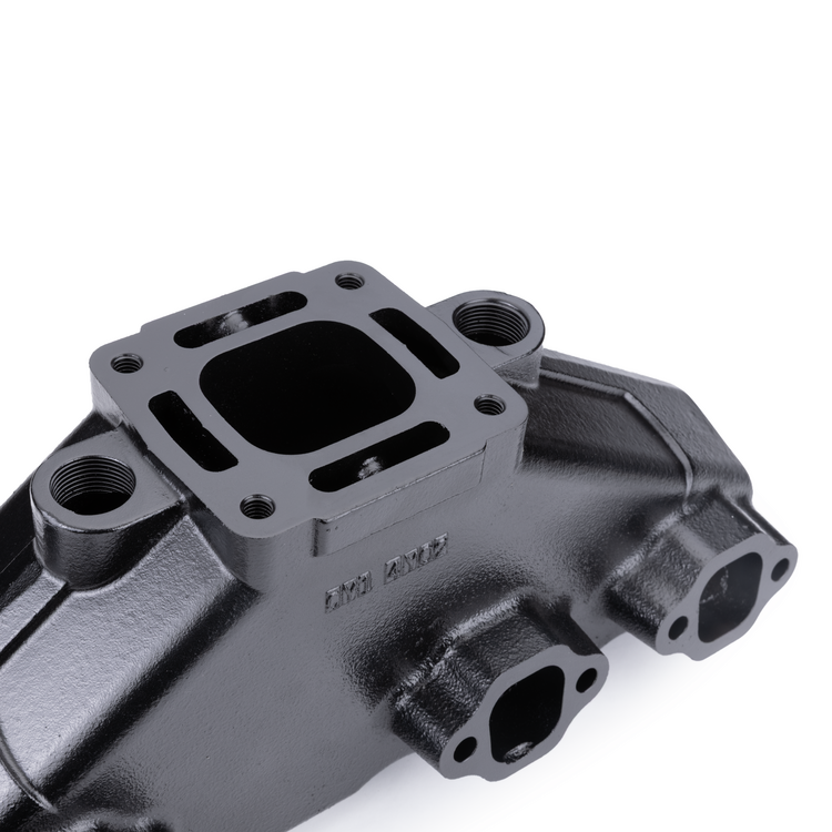 Sierra exhaust manifold on a white background