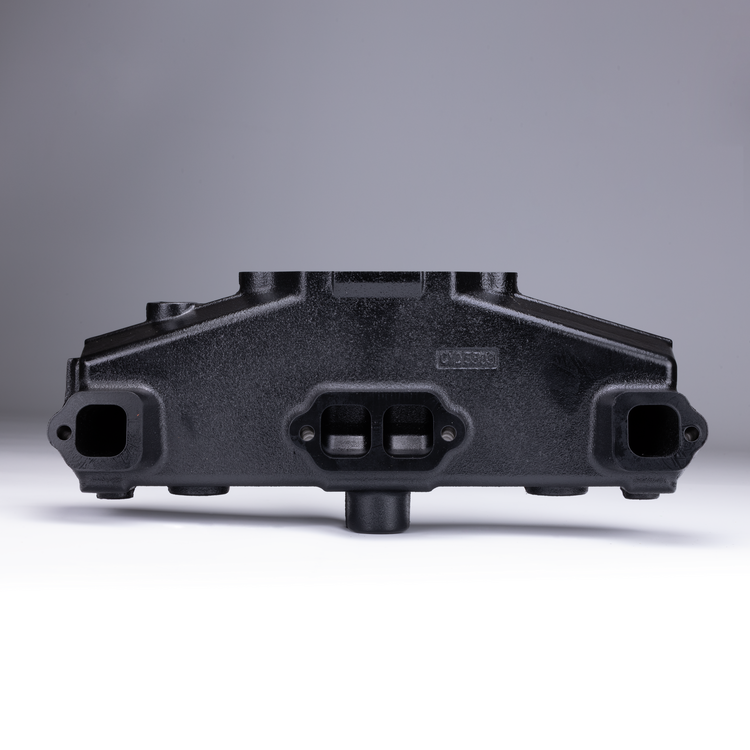 Side view of a black Sierra exhaust manifold on a white and gray background