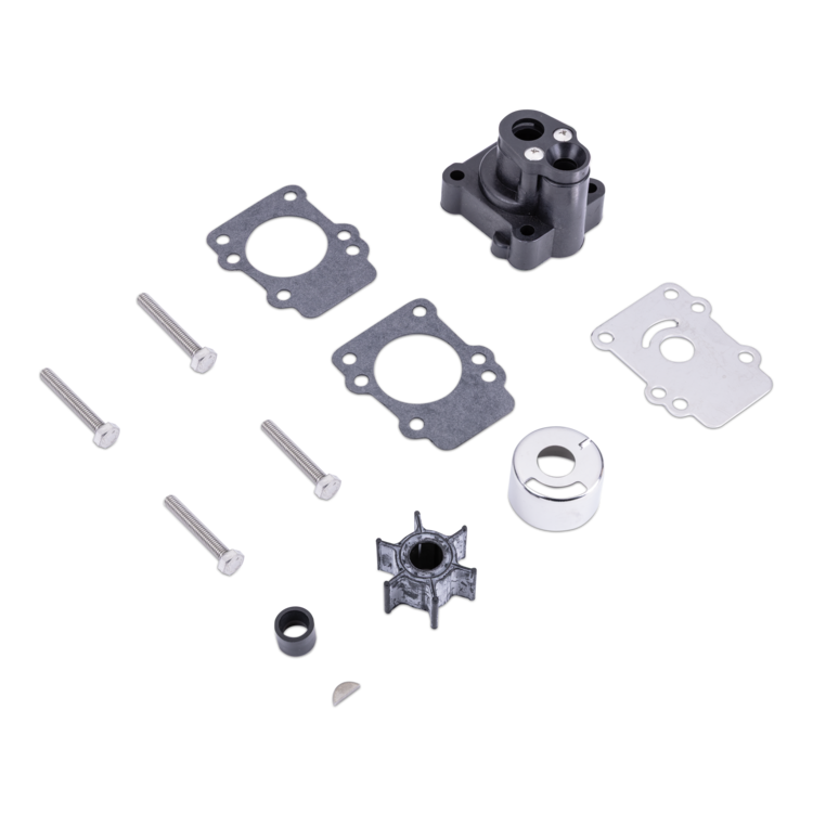 Set of mechanical parts including a shaft, bearings, and gaskets on a white background
