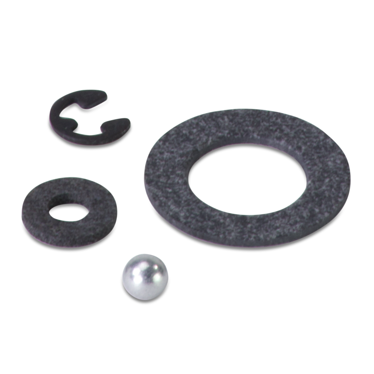 Set of mechanical components including a washer, a ball, and a clip on a white background