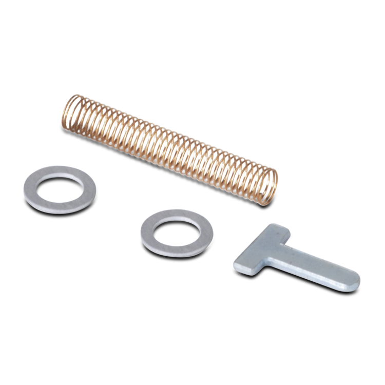 Metal spring, washers, and tool on a white background