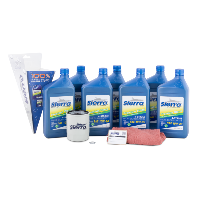 A sierra marine 18-9217 oil change kit with multiple oil bottles, shop rags, and oil filter on a white background