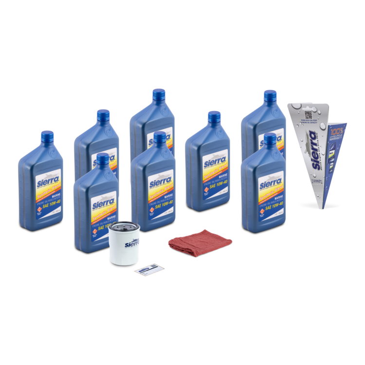 Collection of Sierra oil bottles, oil filter, and shop towel on a white background