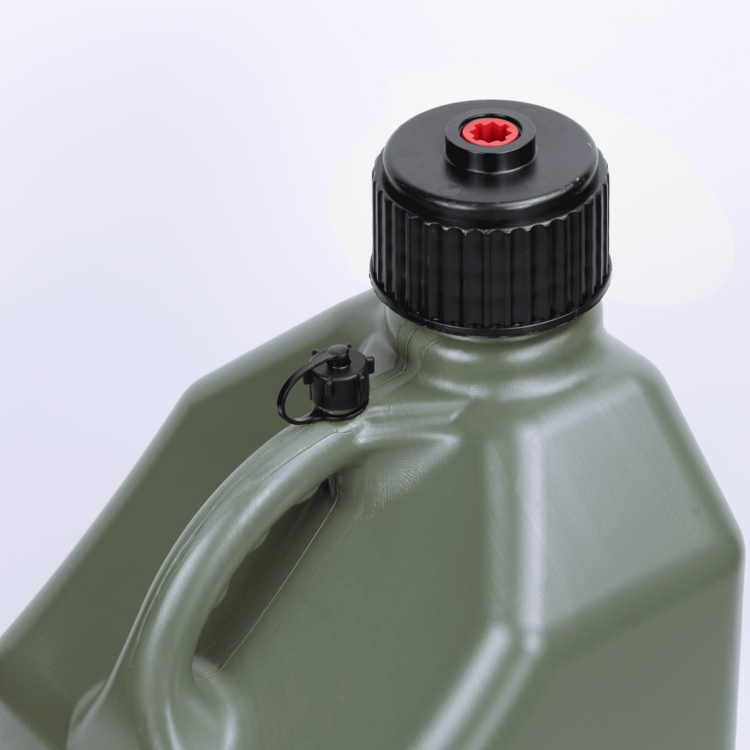 Green plastic container with black cap on a light gray background