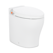 White Dometic macerator toilet with a closed seat on a white background