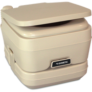 Beige Dometic 962 portable toilet on a white background