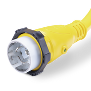 Closeup view of a yellow 50amp Sierra shore power cord plug on a white background
