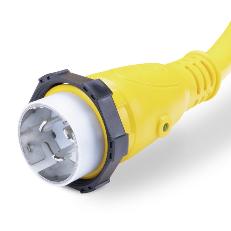 Closeup view of a yellow 50amp Sierra shore power cord plug on a white background