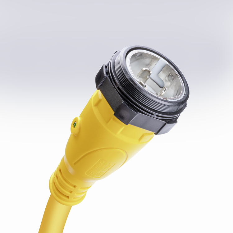 Side view of a yellow 50amp Sierra shore power cord plug