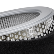 A closeup of a 7-083177 Prime Line air filter on a white background