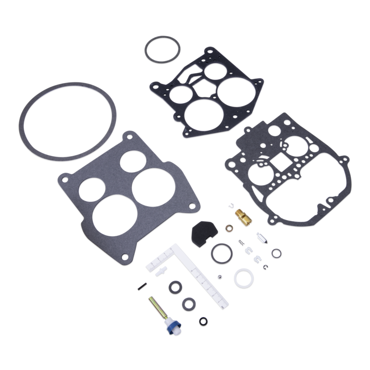A complete engine gasket and seal kit laid out on a clean white background, including multiple black gaskets, rubber O-rings, white plastic seals, small metal pins, and a small blue-and-white threaded component.