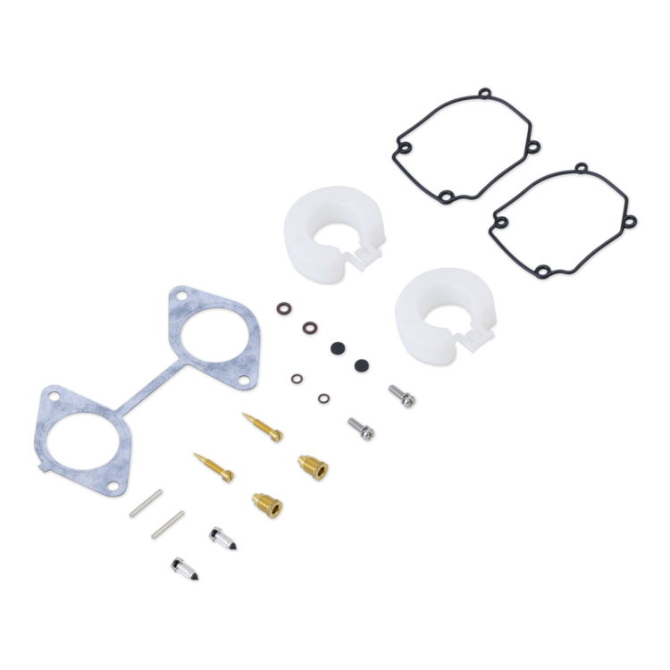 Engine gasket set and related parts on a white background