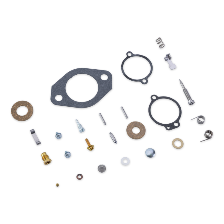 A set of small mechanical hardware and gaskets laid out on a white background, including gaskets, springs, washers, screws, pins, and metal fittings.