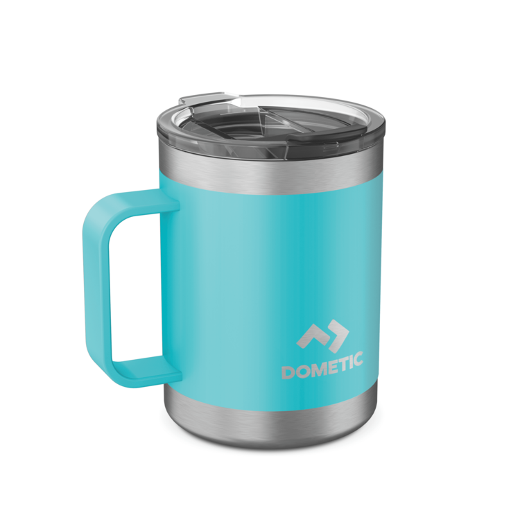 Turquoise travel mug with silver lid and handle on a white background, featuring Dometic logo.