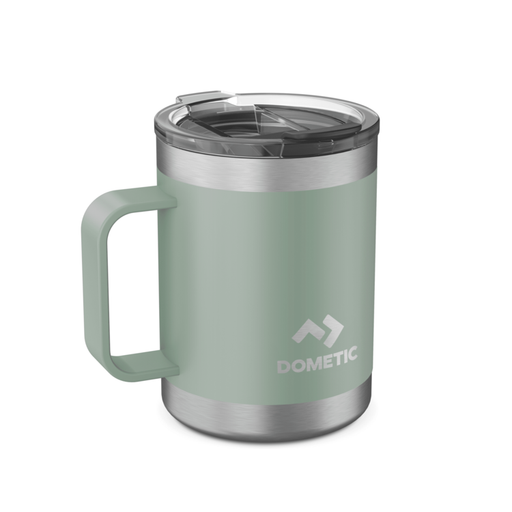 Green insulated mug with handle and clear lid on a white background, featuring Dometic logo.