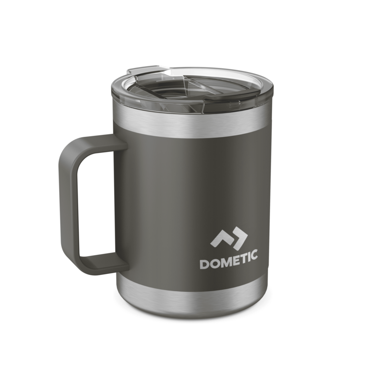 Gray insulated Dometic mug with handle and clear lid on a white background