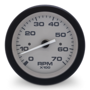 RPM gauge with black rim and white face on a white background