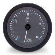 RPM gauge with black face and blue markings on a white background