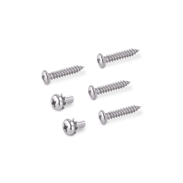 Six metal screws n a white background
