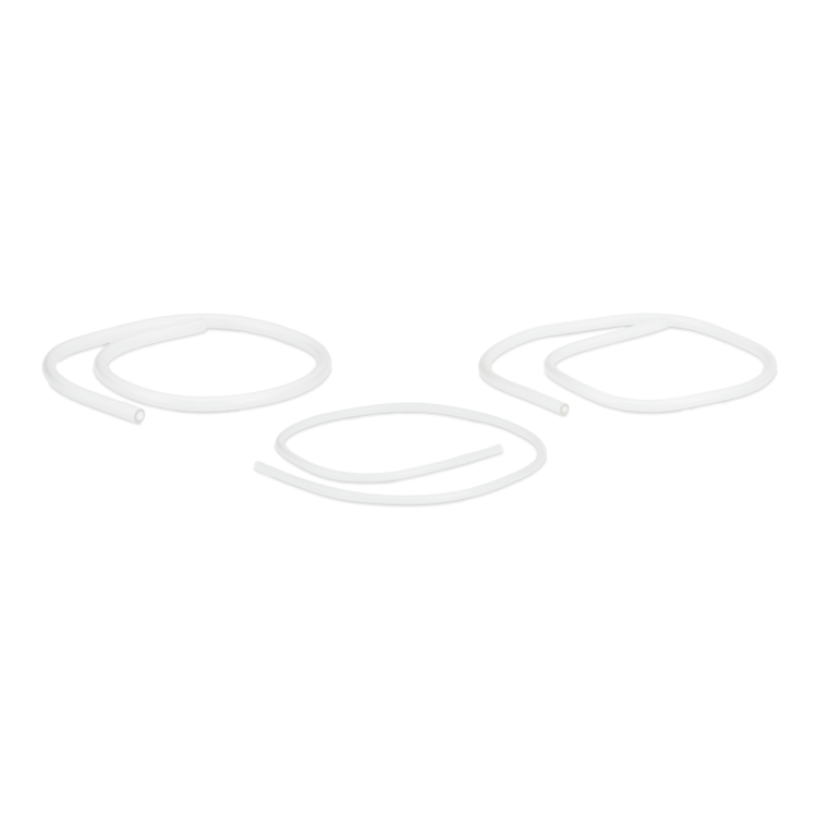 Three small coils of clear fuel tubing on a white background