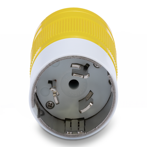 Close-up of a yellow and white electrical plug on a white background