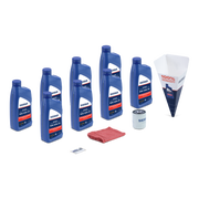 Collection of Sierra oil bottles, filter, and other automotive products on a white background