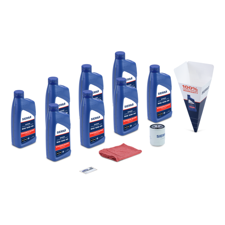 Collection of Sierra oil bottles, filter, and other automotive products on a white background