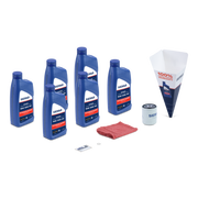 Collection of Sierra oil products including bottles, a funnel, and a filter on a white background.