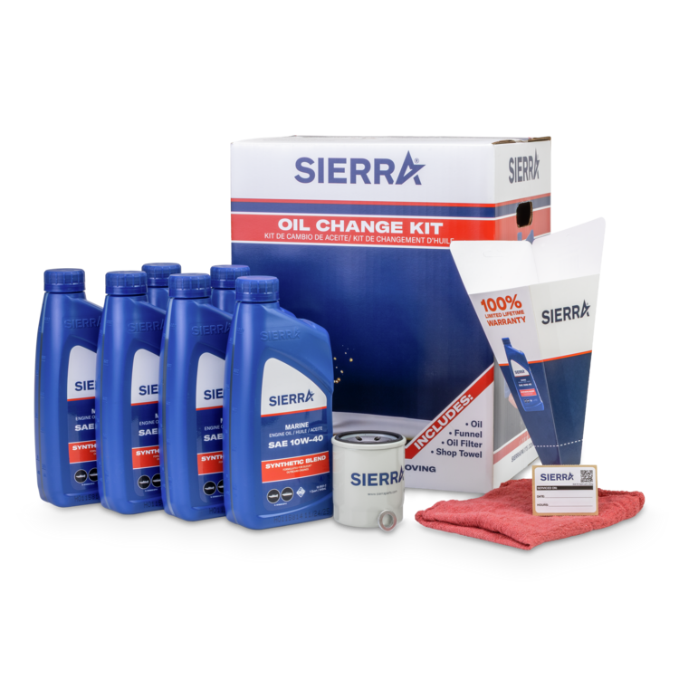 Sierra oil change kit with oil bottles, filter, and other components on a white background
