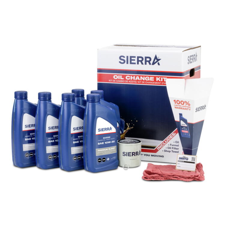 Sierra oil change kit with oil bottles, filter, and accessories on a white background