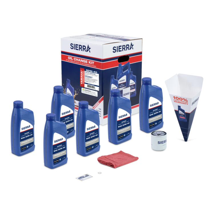 A collection of blue Sierra marine oil bottles, oil filter, red shop towel, and Sierra branded retail box on a white background