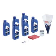 Collection of Sierra oil products including bottles, a funnel, filter, and cloth on a white background.