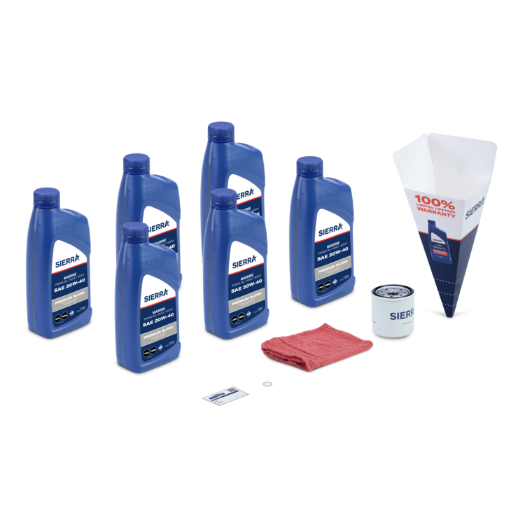 Collection of Sierra oil products including bottles, a funnel, filter, and cloth on a white background.