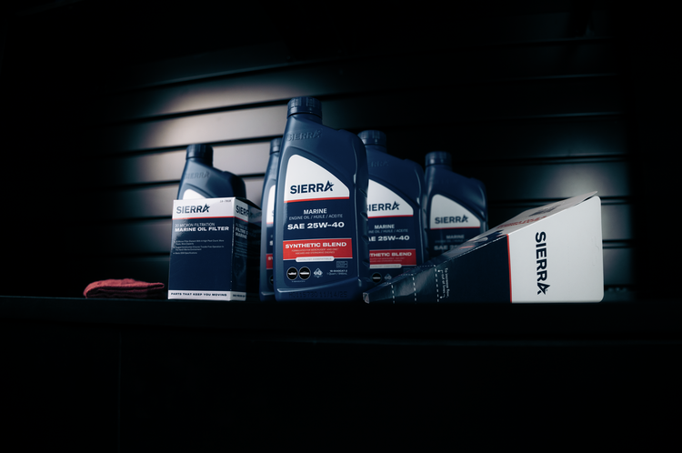 Sierra oil filters and packaging on a dark background