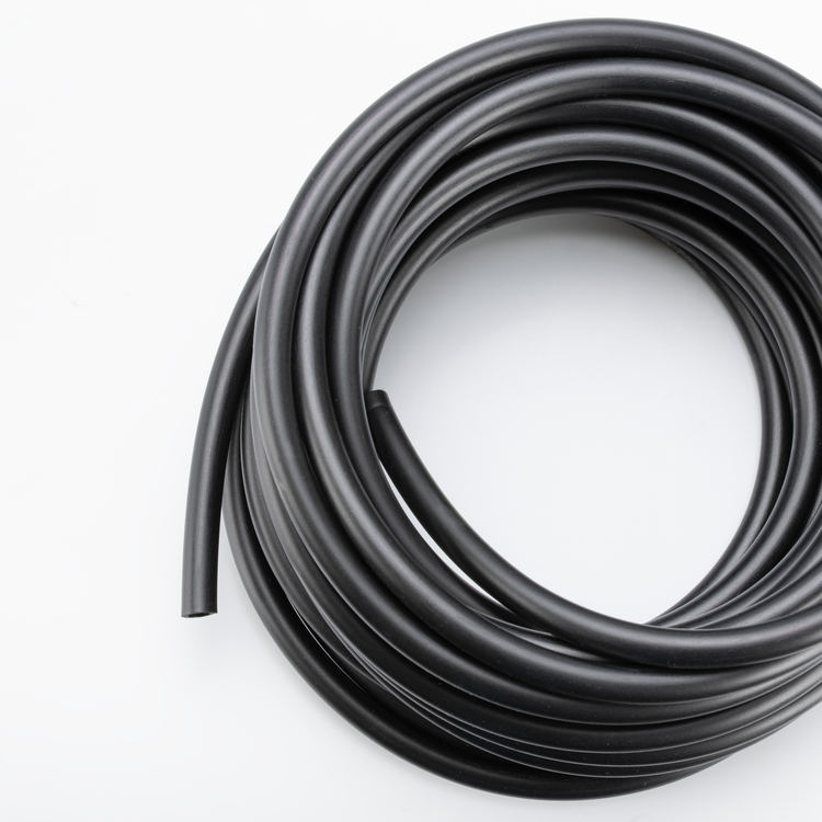 A coiled roll of black rubber tubing on a plain white background.