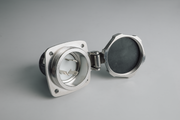 Metallic connector on a gray background