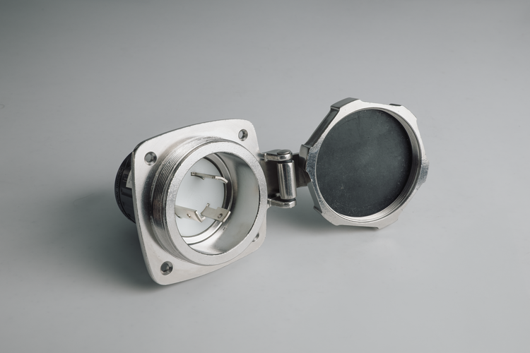 Metallic connector on a gray background