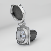 Metallic power inlet on a light gray background