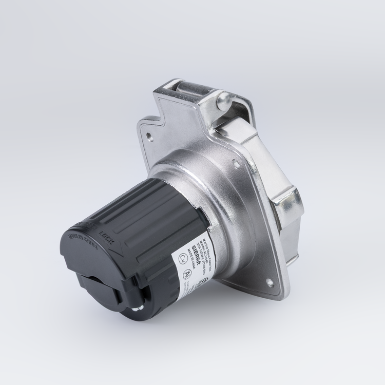 Metallic power inlet on a light gray background