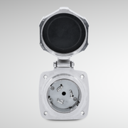 Metallic electrical connector on a gray background