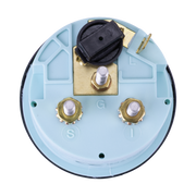 Rear view of trim gauge with a blue casing and brass connectors on a white background
