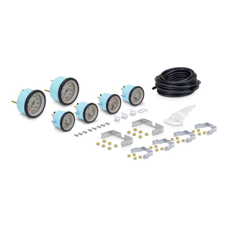 Collection of gauges, hardware, and hose on a white background