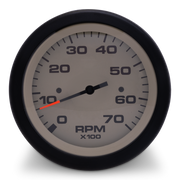 RPM gauge with black rim and gray face on a white background