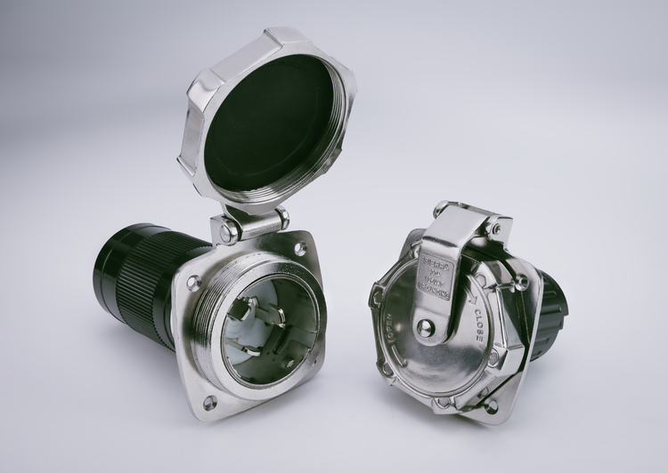 Two metal connectors on a light gray background