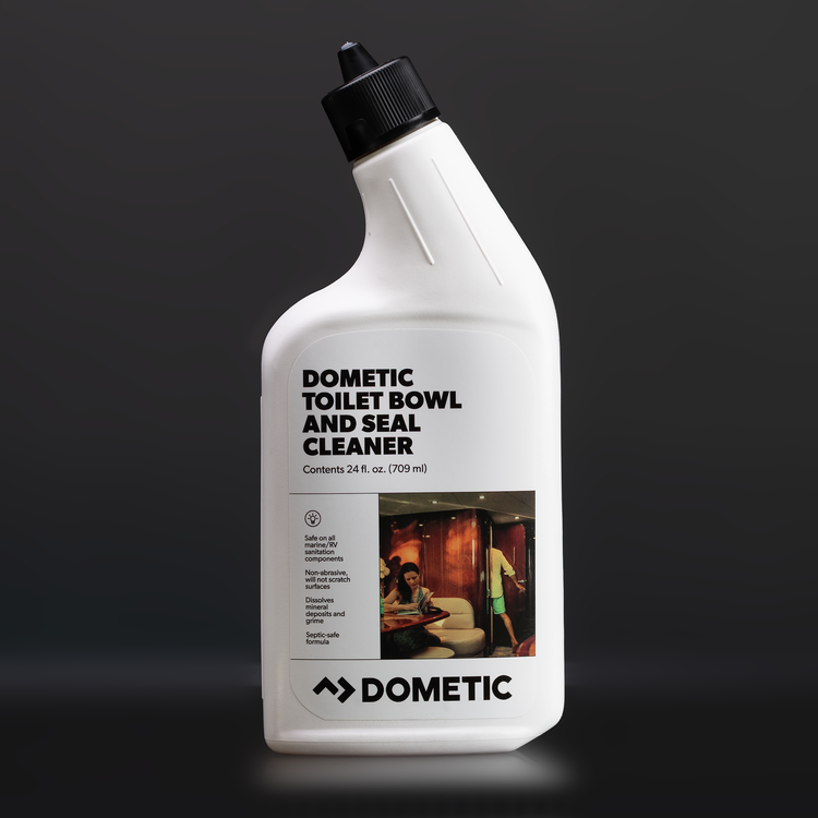 Dometic toilet bowl and seal cleaner bottle on a dark background