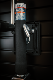 Black trailer jack handle with Sierra label on a dark background