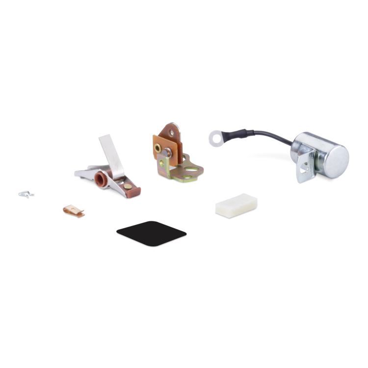 A set of small mechanical hardware components and a black rectangular pad, photographed on a plain white background.