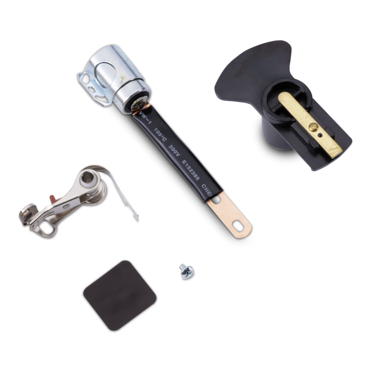 Tune up kit with a black lever, silver metal components, a small square black insert, and a small silver screw, laid out on a white background.