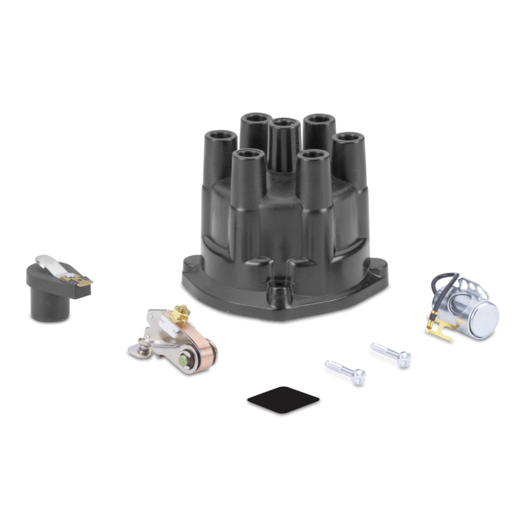 A black distributor cap kit with silver and copper ignition components, a black spark plug, and mounting hardware, arranged on a clean white background.